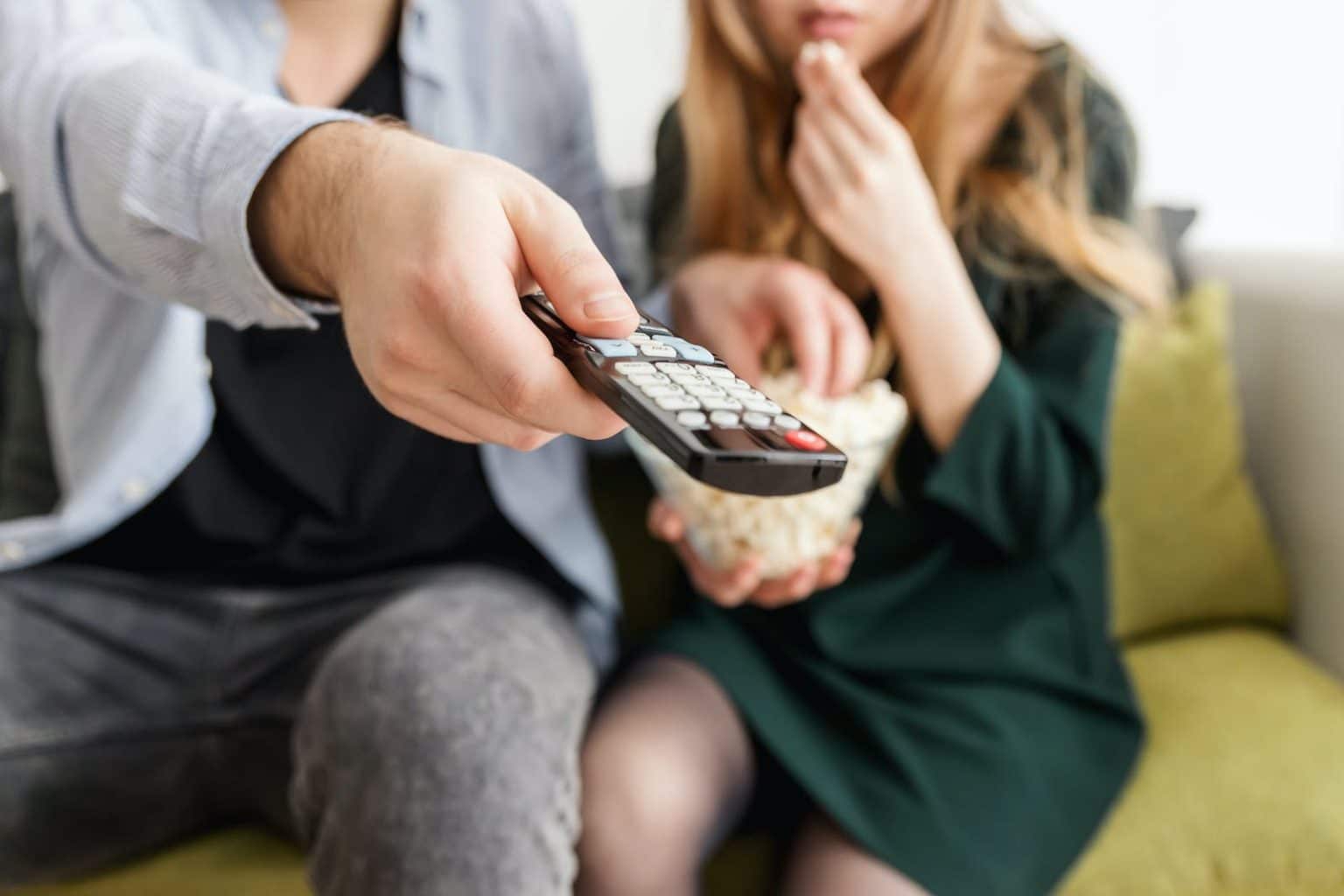 The Impact of the Rising UK TV Licence Fee: A Deeper Look into the Changes Man Holding Remote Control