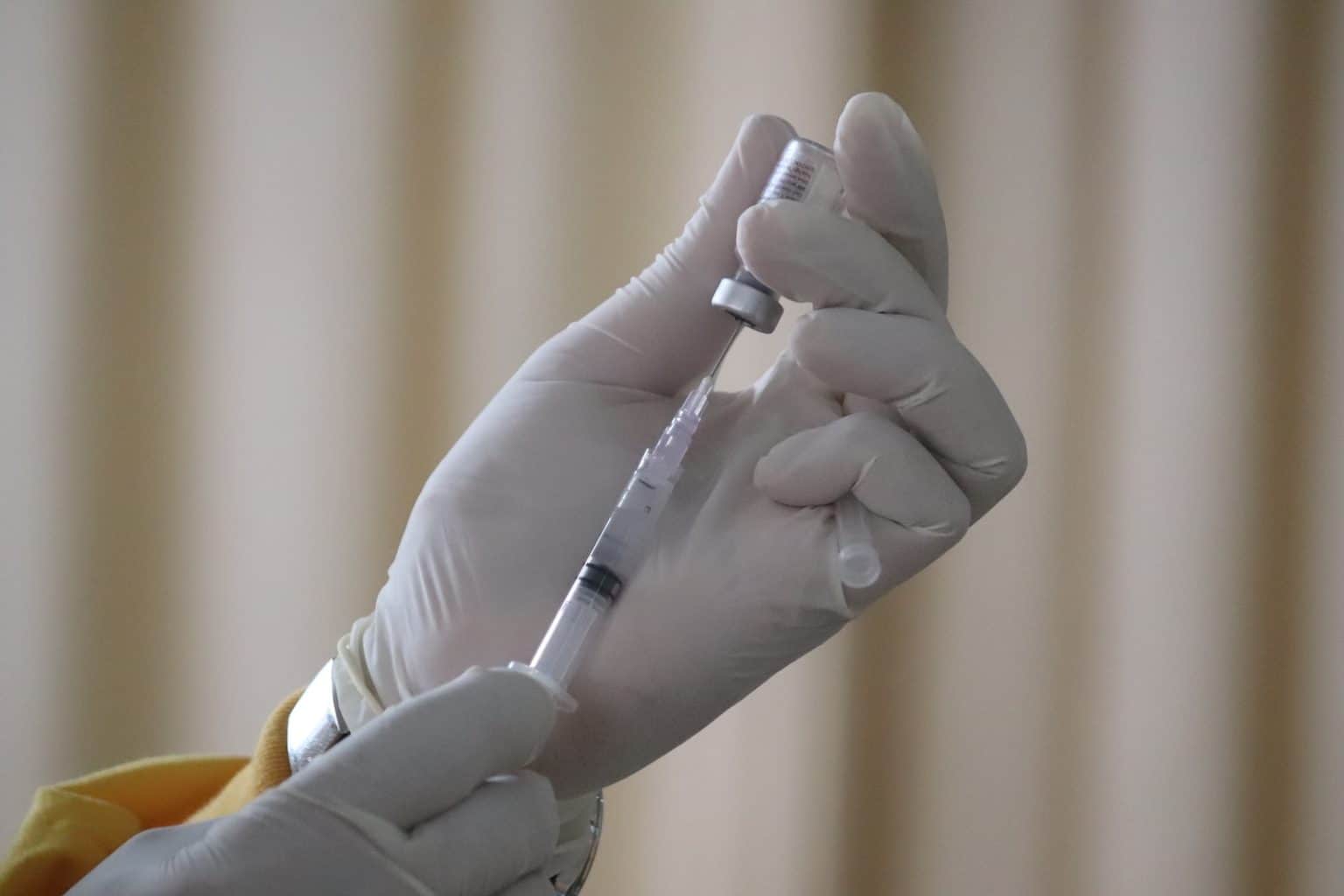 Measles Cases Surge 4,300% in Europe: Urgent Vaccination Needed person holding white ballpoint pen