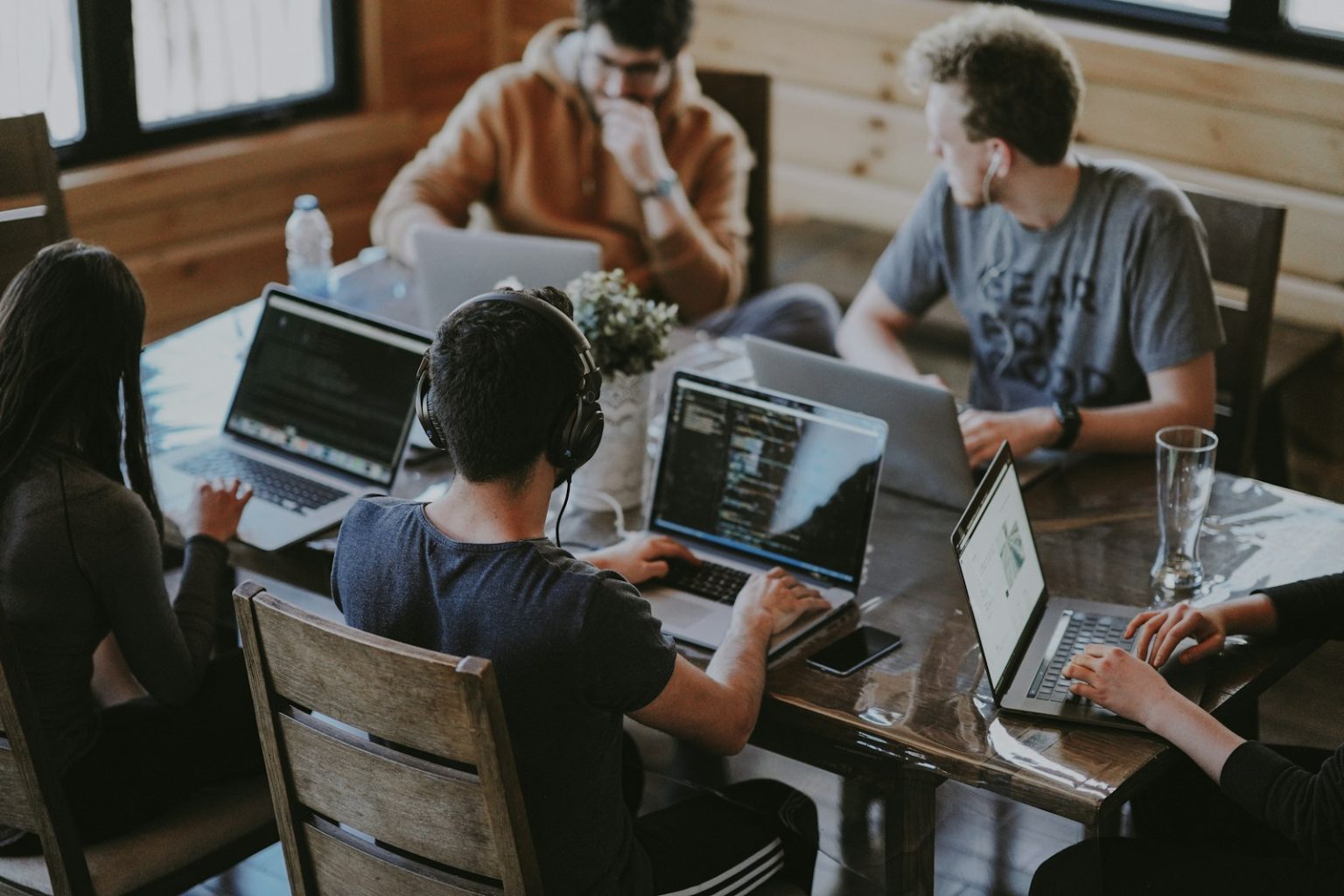 Finance Sector Leads in Skills-Based Hiring Trends group of people using laptop computer